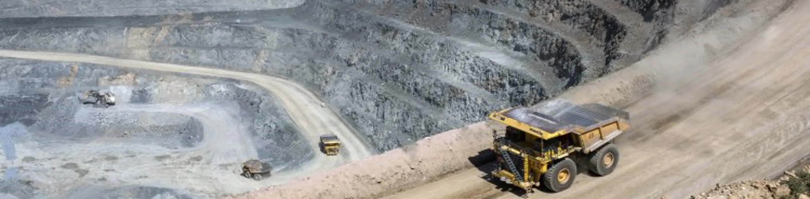 Mining haul truck operating in an open-pit mine