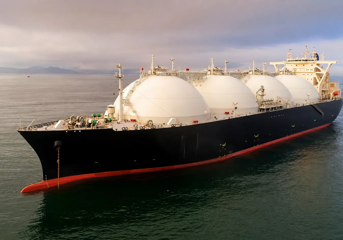 LNG carrier transporting liquefied natural gas at sea
